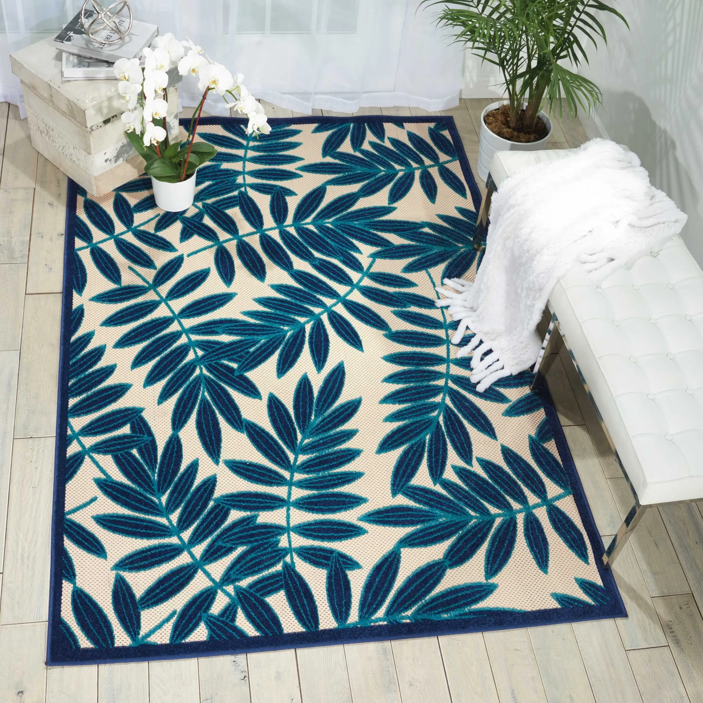 4’ x 6’ Navy and Beige Leaves Indoor Outdoor Area Rug
