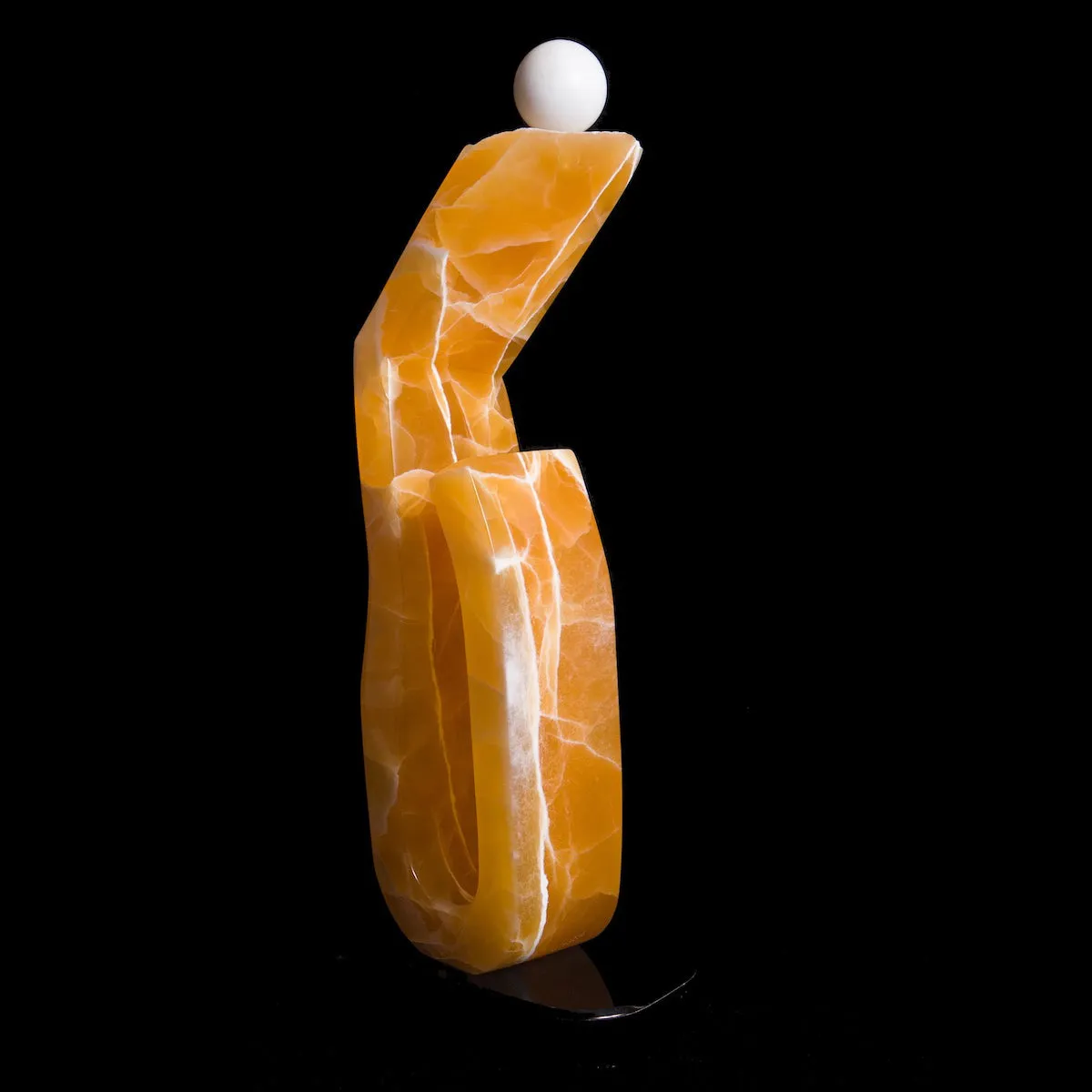 CARVED STONE BALANCING ACT