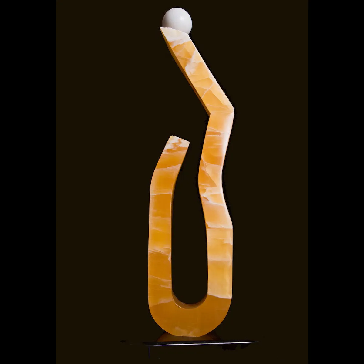 CARVED STONE BALANCING ACT