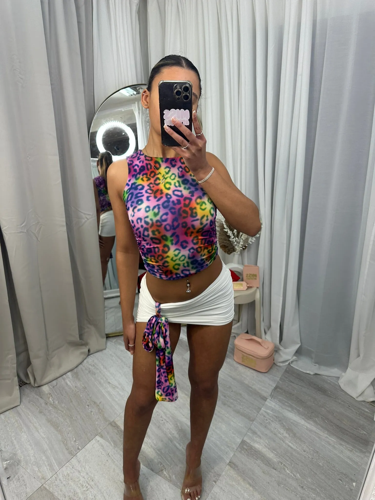 Crop top and mini skirt with ruch side and drape piece