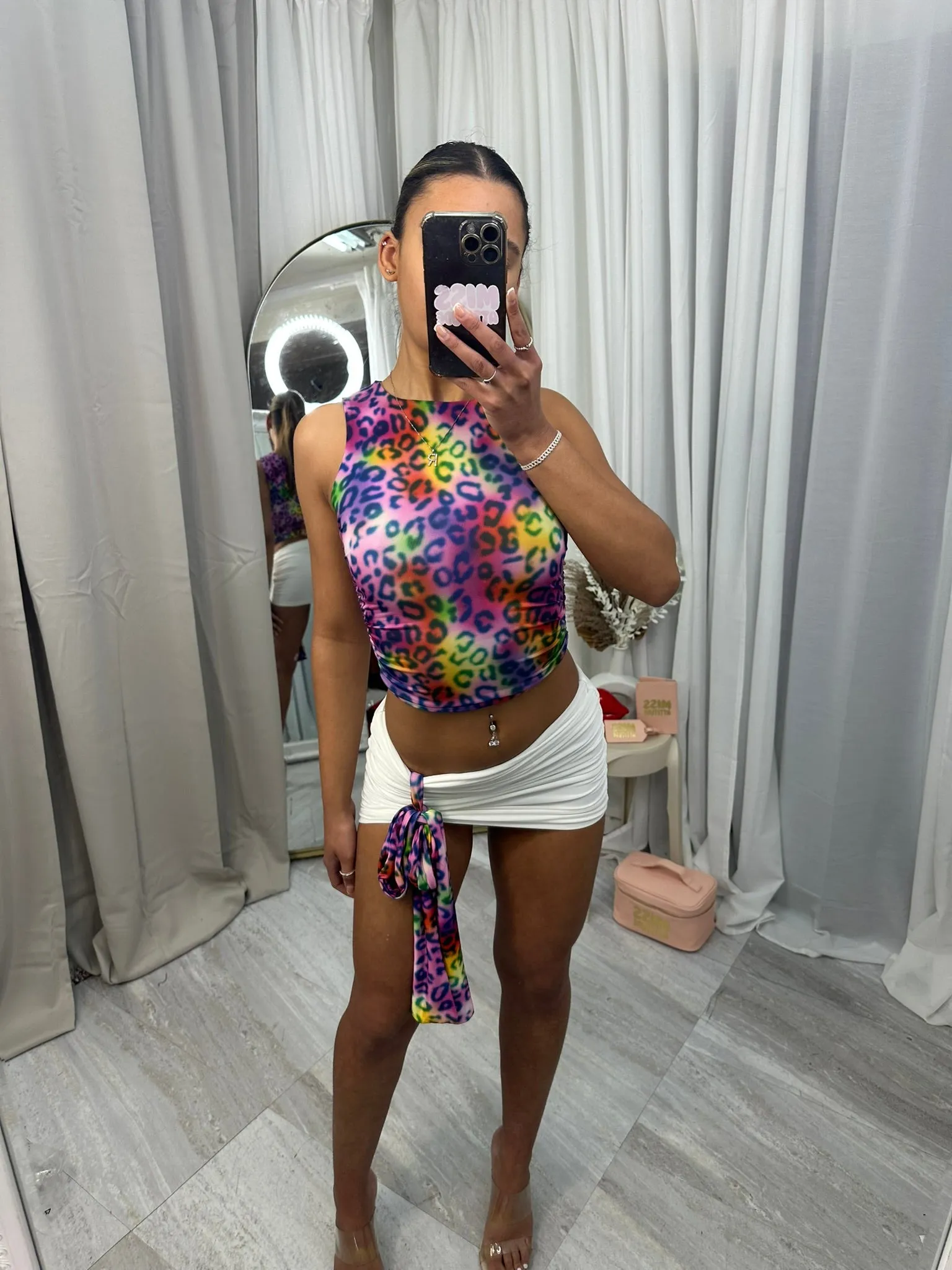 Crop top and mini skirt with ruch side and drape piece