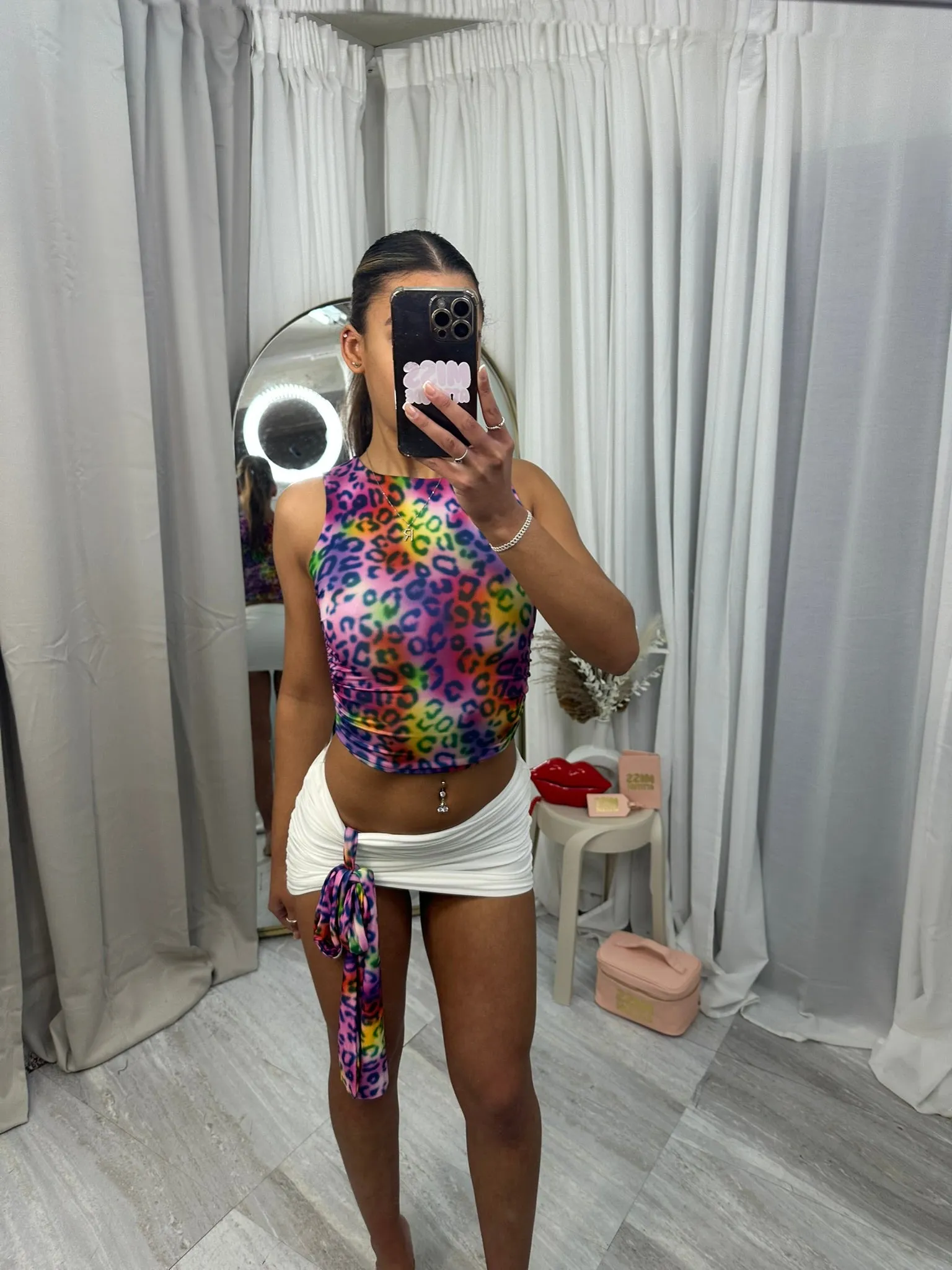 Crop top and mini skirt with ruch side and drape piece