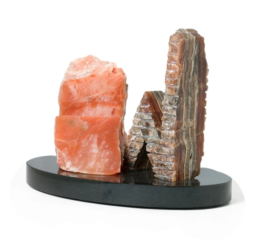 ONYX AND ALABASTER SCULPTURE BETWEEN A ROCK AND A HARD PLACE
