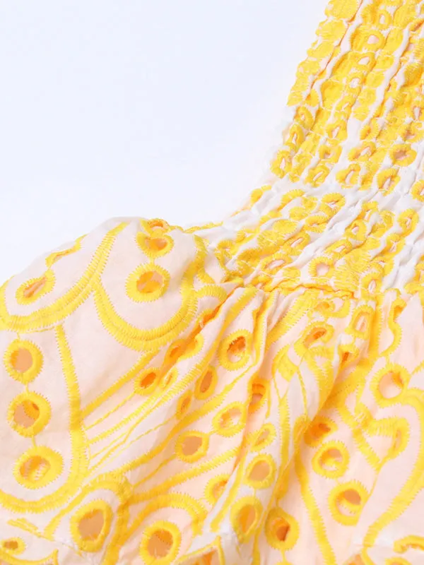 Strapless Mini Dress with Geometric Print and Ruffle Hem