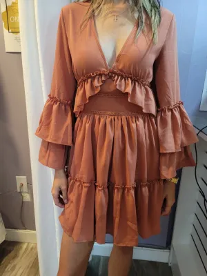Women's long sleeve tie back ruffle mini dress